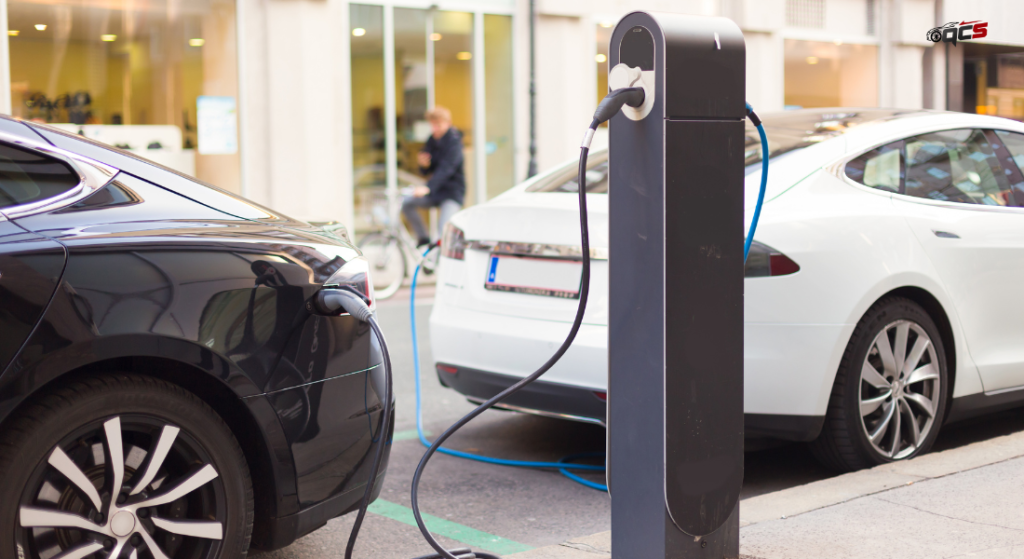 Tesla at charging station
