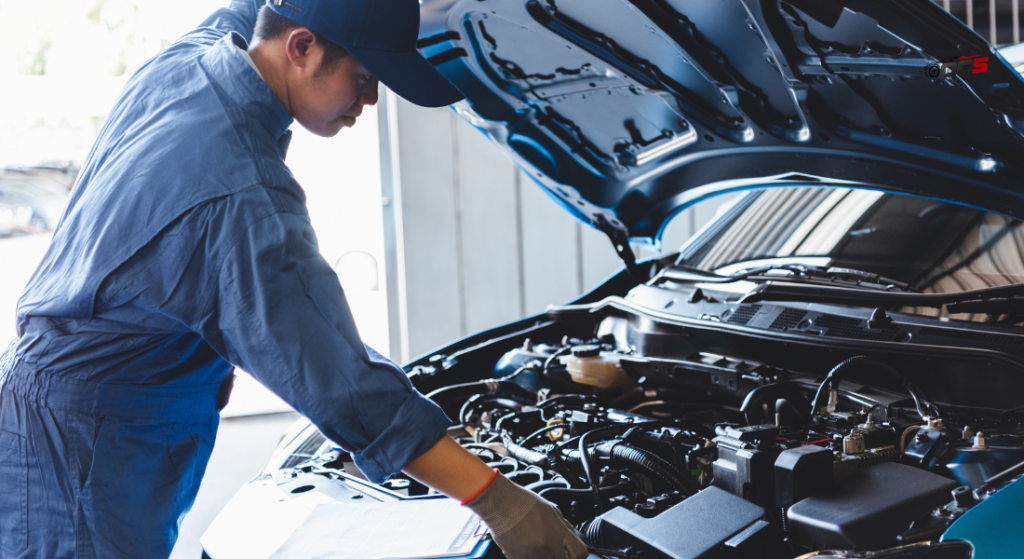 professional checking an car engine